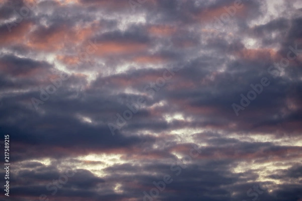 Obraz Multicolored clouds at sunset as an abstract background