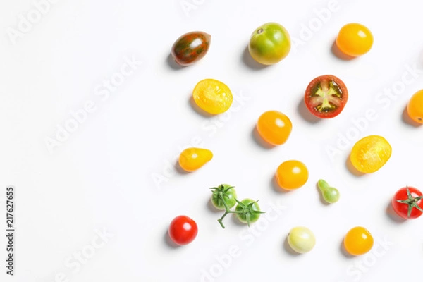 Obraz Flat lay composition with different tasty tomatoes on white background