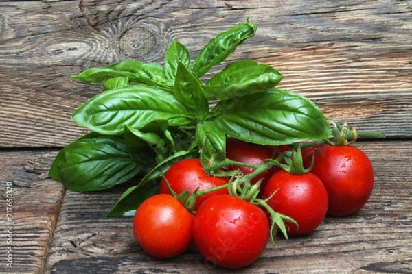 Obraz pomidory w koszyku