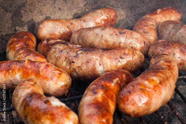 Fototapeta sausages on a grill