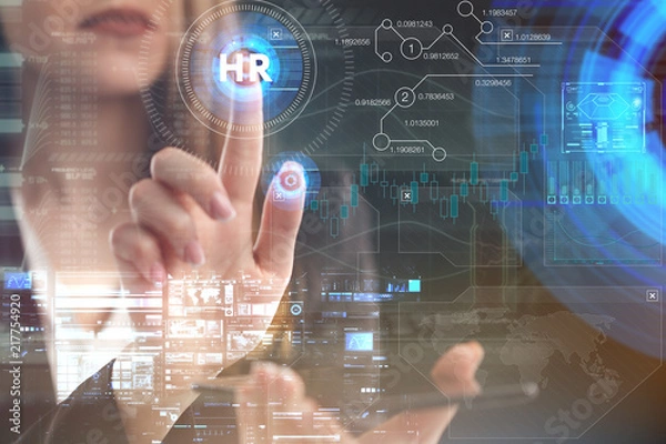 Fototapeta The concept of business, technology, the Internet and the network. A young entrepreneur working on a virtual screen of the future and sees the inscription: HR