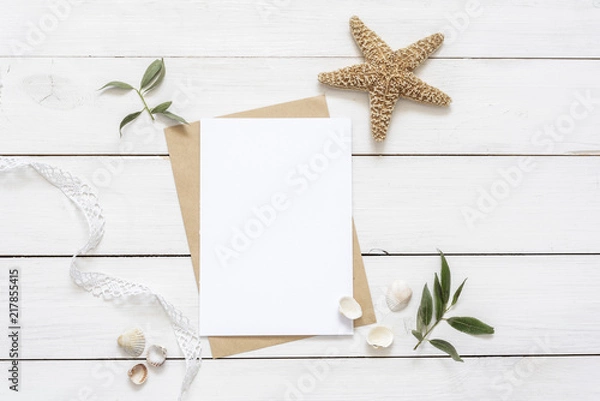 Fototapeta Elegant flat lay with card blank space, stationary, vintage lace, leaves, starfish. Ready to insert your text, invitation, wedding or logo. Best for social media, backgrounds, blogs, wedding