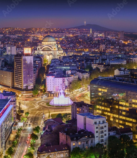 Obraz Aerial view of Belgrade Slavia Square, St Sava Temple, Avala Mountain by night panorama with city lights and fountain