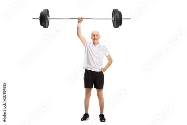 Fototapeta Senior lifting a barbell with one hand