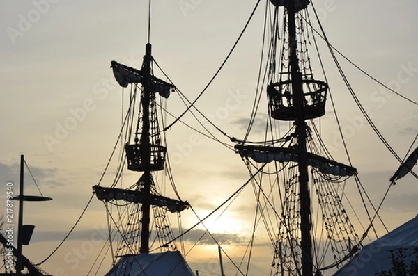Fototapeta pirate ship at sunset