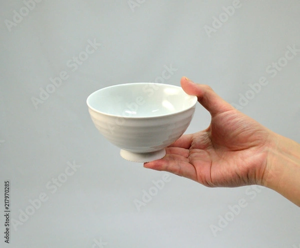Obraz 手で持った白い茶碗