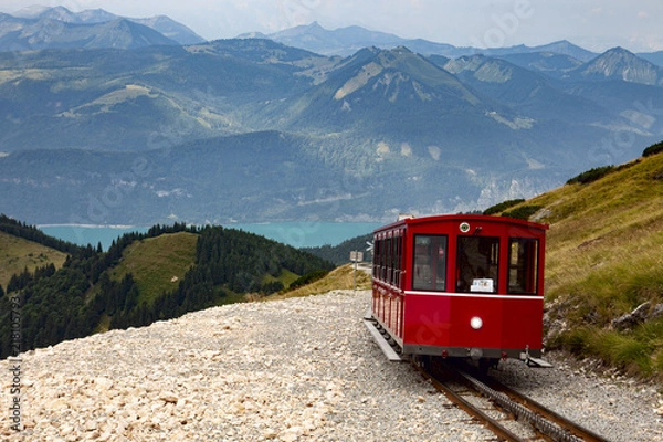 Fototapeta schafbergbahn train approaching summit