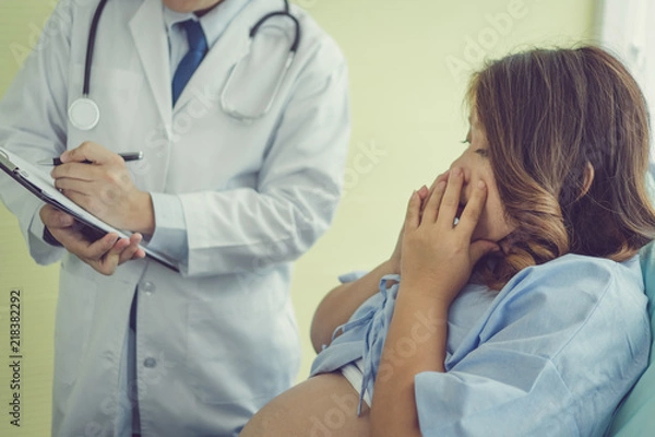 Fototapeta Pregnant There are feelings and nervous. After the doctor explained the results. Fetal examination. Health check. Doctor. patient.