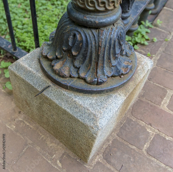 Fototapeta Caterpillar  on Lamp Post Base 