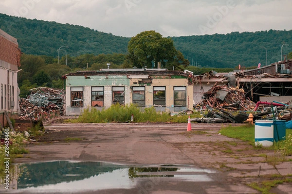 Obraz old factory being tore down 