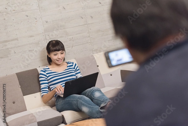 Fototapeta using laptop recording video