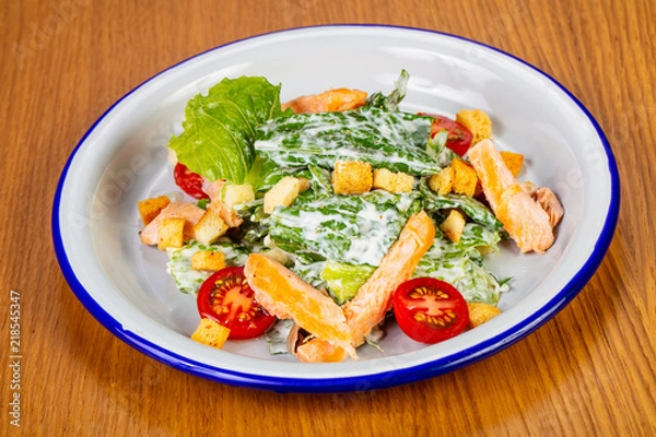 Fototapeta Caesar salad with grilled salmon