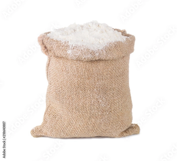 Fototapeta Wheat flour in burlap sack bag isolated on white background