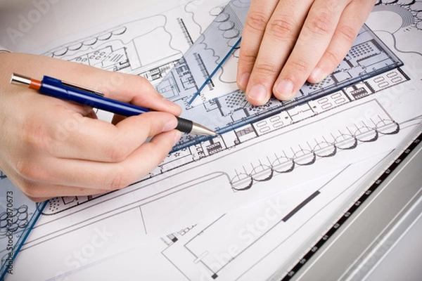 Obraz Architectural plans and blueprints in office