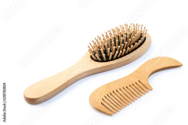 Obraz Wooden comb brush isolated with clipping path.