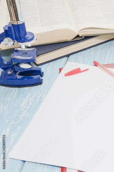 Fototapeta Microscope, books and others tools for education.