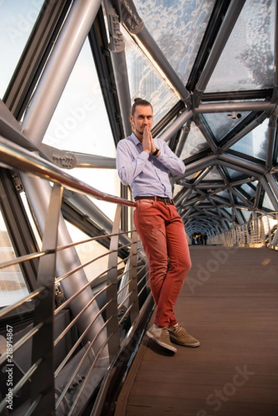 Fototapeta man standing in a corridor 