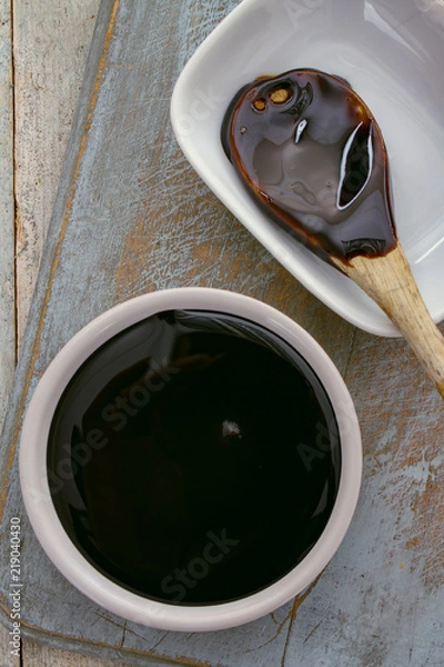 Obraz molasses treacle in dish