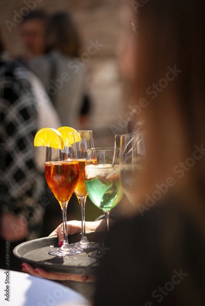 Obraz Waiter serving champagne on a tray