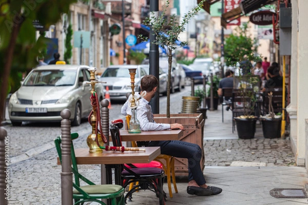 Fototapeta Outdoor cafe in cener of Europe, summer vacation time