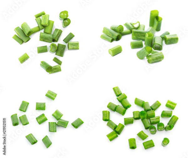 Obraz Set with cut green onion on white background