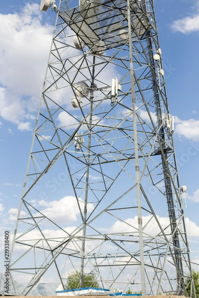 Obraz Communications tower with blue Cloud sky background