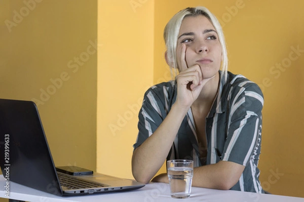 Fototapeta office worker thinking looking sideways