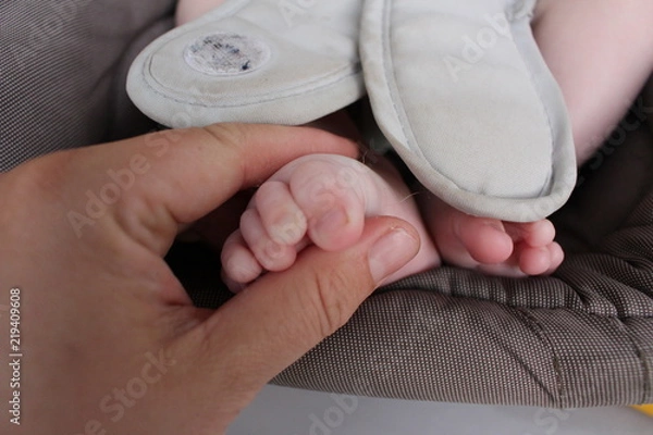 Obraz pied de bébé et sa maman
