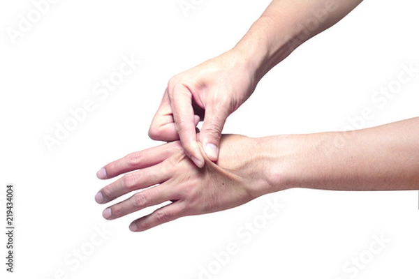 Obraz Skin elasticity check. the right hand  pull the skin on the back of left hand
