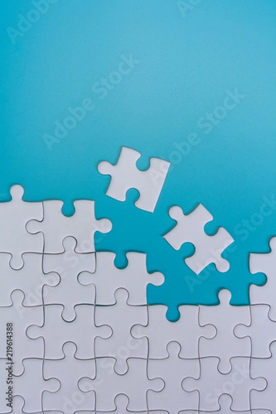 Obraz jigsaw puzzle on blue background