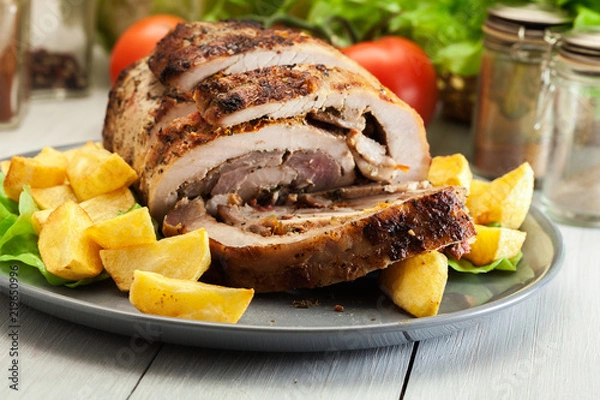 Fototapeta Roasted pork roll stuffed with other meat