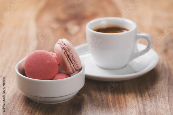 Fototapeta espresso with macarons on wood table