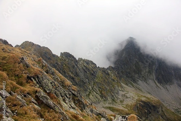 Fototapeta Clouds over the mountains