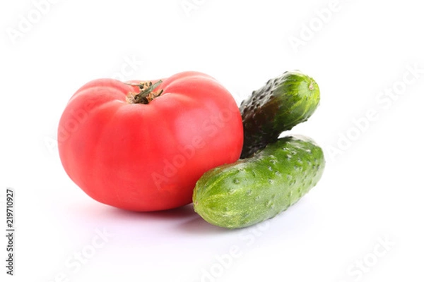 Fototapeta Ripe vegetables on a white background.