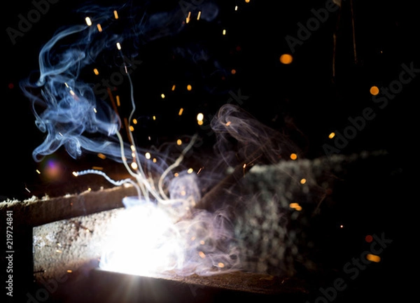 Obraz Flash and sparks from electric welding