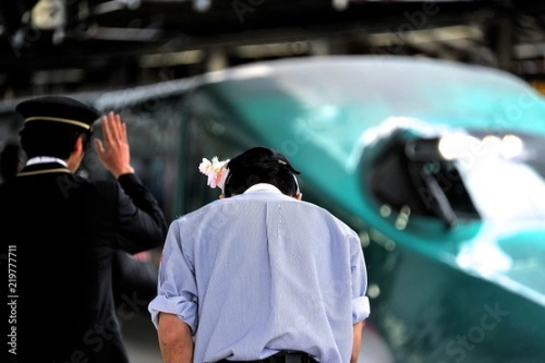 Obraz 新幹線と駅員