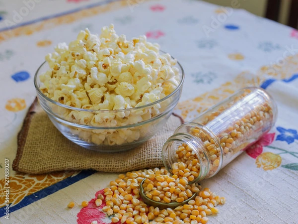 Obraz glass bowl with popcorn and corn seeds