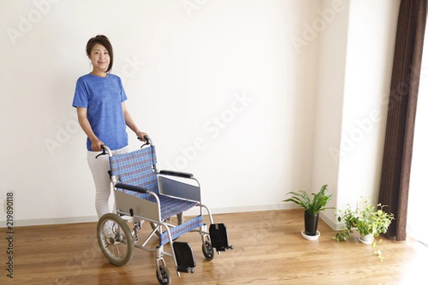 Fototapeta 車椅子と女性 介護イメージ