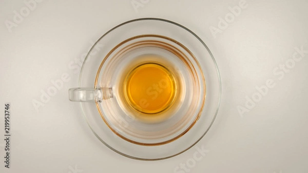 Fototapeta TOP VIEW: Empty glass tea cup