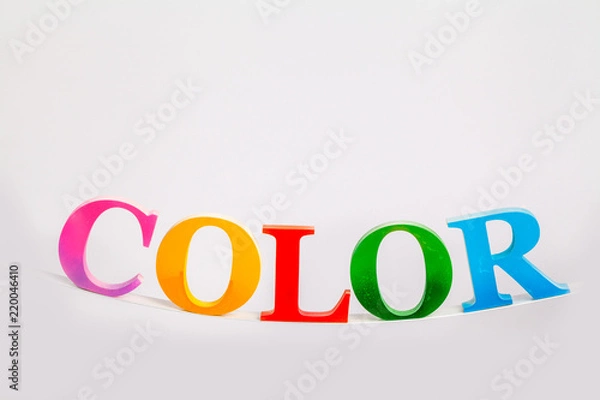 Fototapeta colorful character of the word color in white background with copy space