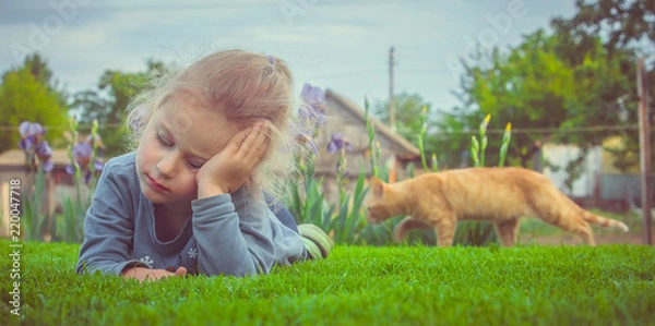 Obraz child and ginger cat 