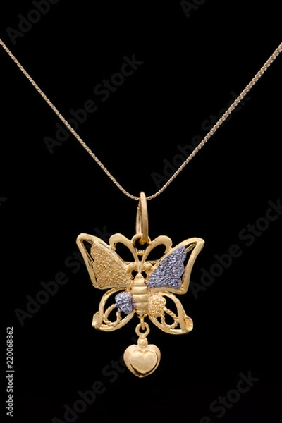 Fototapeta Modern golden pendant on a dark pattern