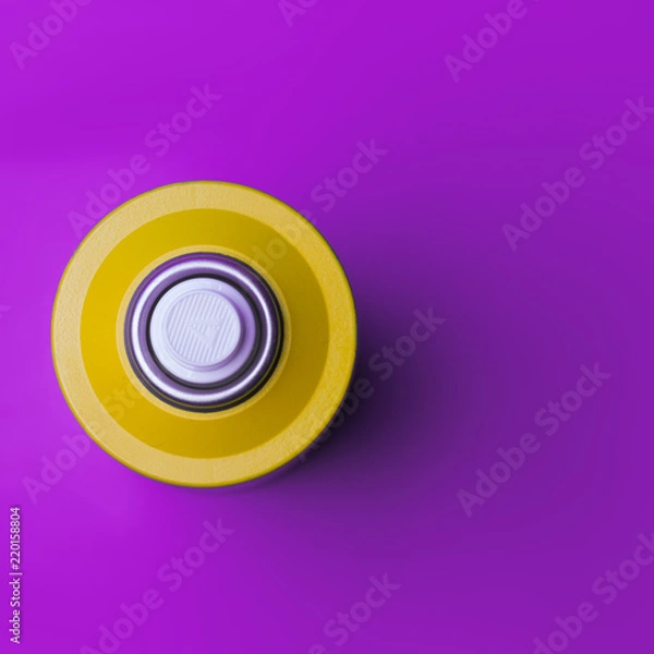 Obraz Graffiti spray on a purple background. Concept image