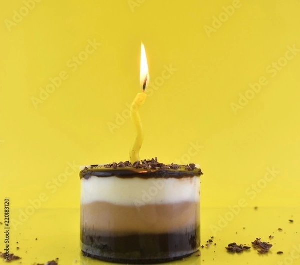 Obraz candle on yellow background