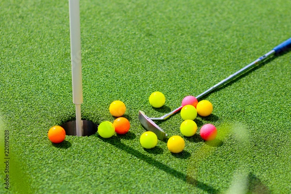 Obraz Close-up of miniature golf hole with bat and ball