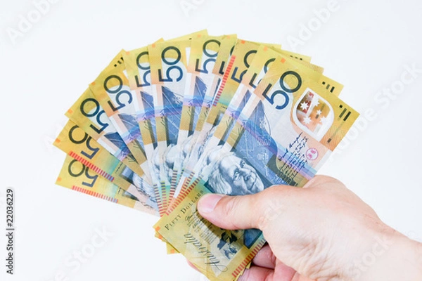 Obraz Australian fifty dollar notes in the hand.
