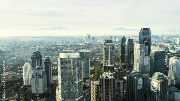 Fototapeta Jakarta Central Business District in misty morning