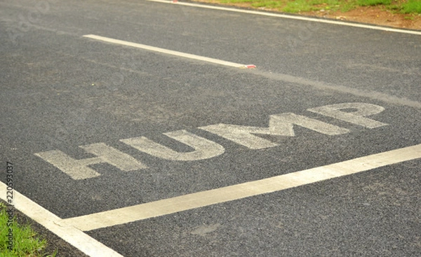 Fototapeta Hump Warning Sign Return On Road