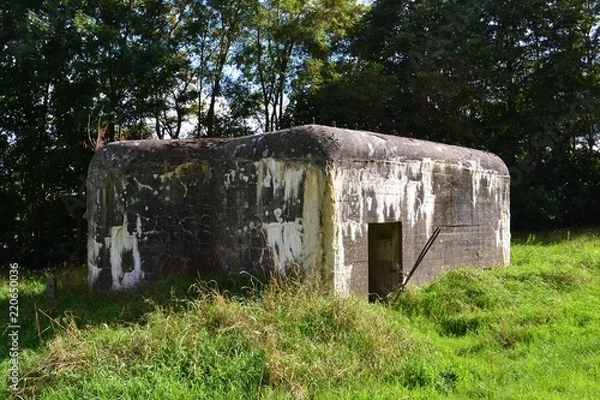 Fototapeta Pillbox-type world War 2 bunker in a field near Leuven, Belgium.