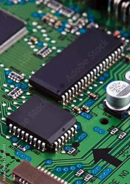 Fototapeta Microchips on circuit board